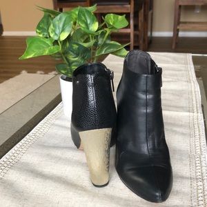 Black and Gold Heeled Boots Circus 9